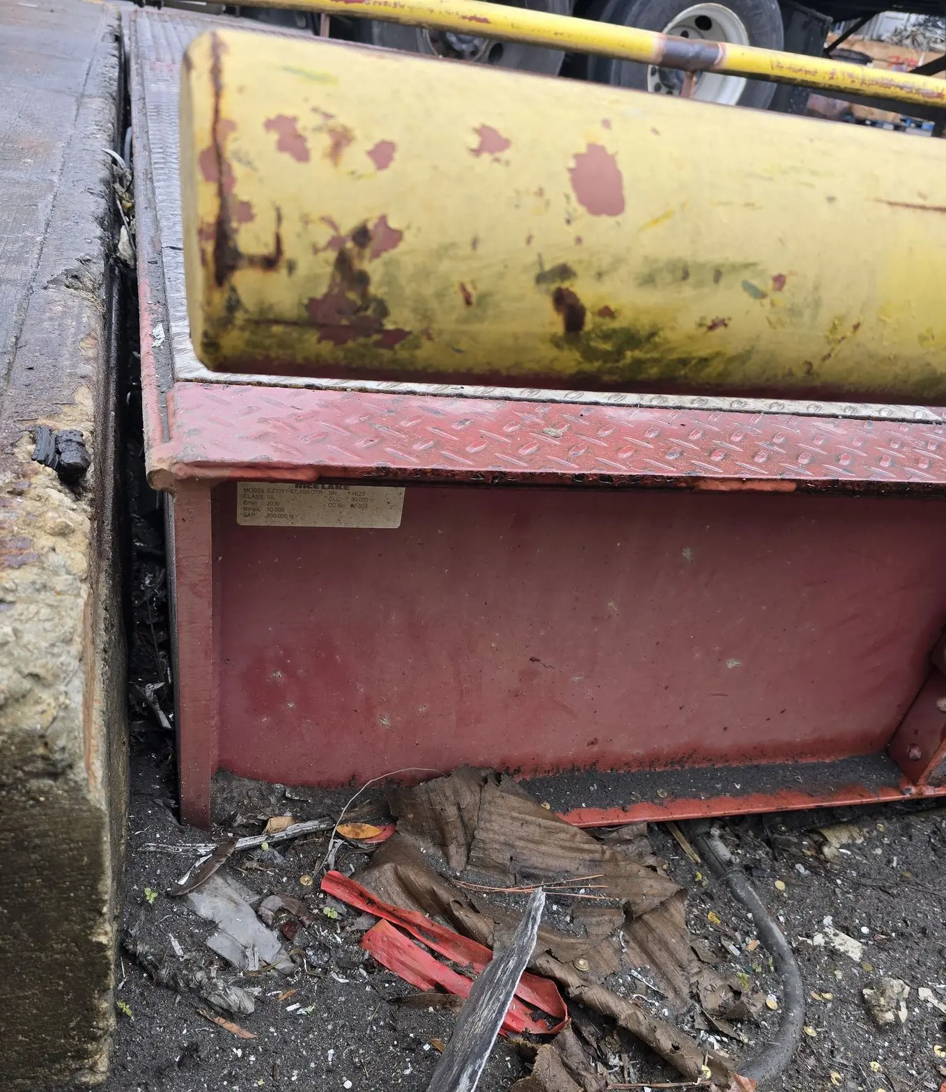 truck scale in foundation with debris built up under the scale causing calibration issue